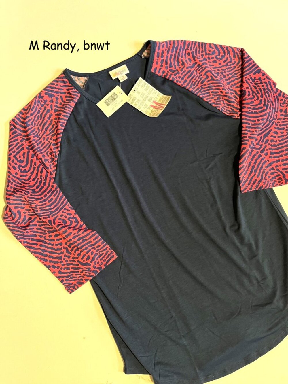 Medium Lularoe Randy unisex raglan jersey top, navy pink fingerprint sleeves